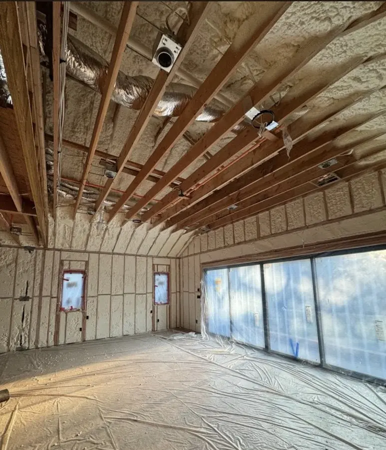 Interior walls and ceiling insulated with spray foam during new construction in Orangetown